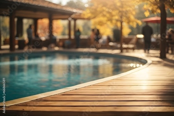 Obraz Empty wooden table top with swimming pool in background with bokeh autumn sunlight. Generative Ai.