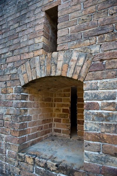 Obraz Brick wall with gun slots