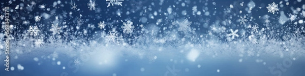 Fototapeta Winter background with snowflakes and bokeh lights. Banner.