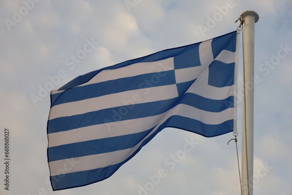 Fototapeta flag of Greece waving against sky