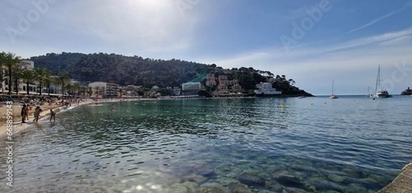 Fototapeta Port de Sóller is a village and the port of the town of Sóller, in Mallorca, in the Balearic Islands, Spain. Along with the village of Fornalutx and the hamlet of Biniaraix they combine to form Sóller