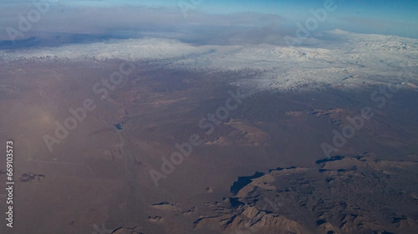 Fototapeta view of mountains and deserts from a passenger plane. Iran, Iraq, Persian Gulf
