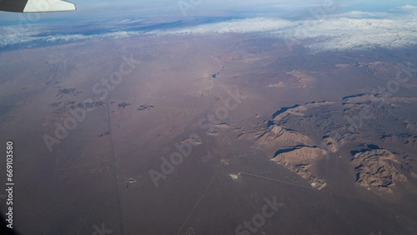 Fototapeta view of mountains and deserts from a passenger plane. Iran, Iraq, Persian Gulf
