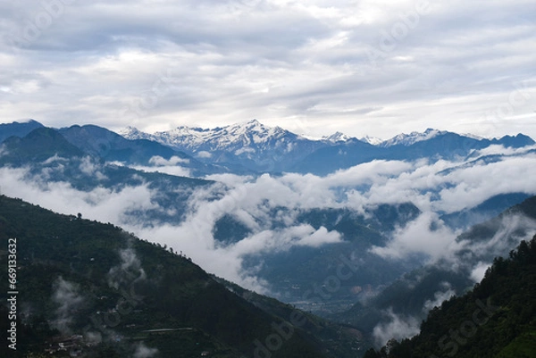 Fototapeta mountains and clouds