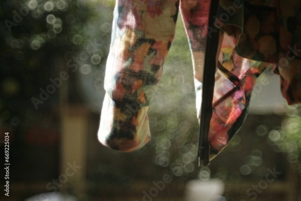 Fototapeta christmas tree hanging on a tree