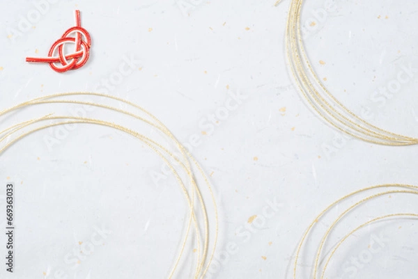 Obraz 金の水引と和紙の年賀状素材