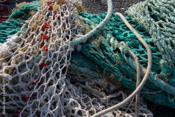 Fototapeta Close up of empty colorful fishing nets