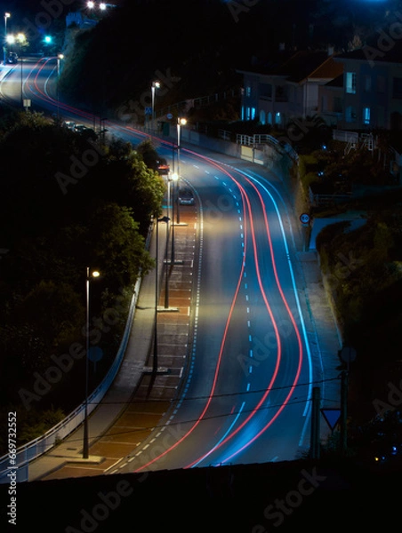Obraz Car Light Trails Illuminate a Nighttime Roadway