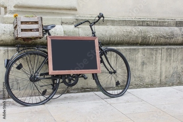 Obraz Fahrrad mit Schiefertafel