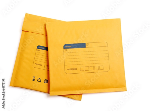 Fototapeta Yellow letter envelope isolated with clipping path.