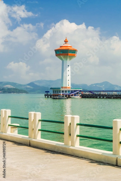 Fototapeta lighthouse and pier.