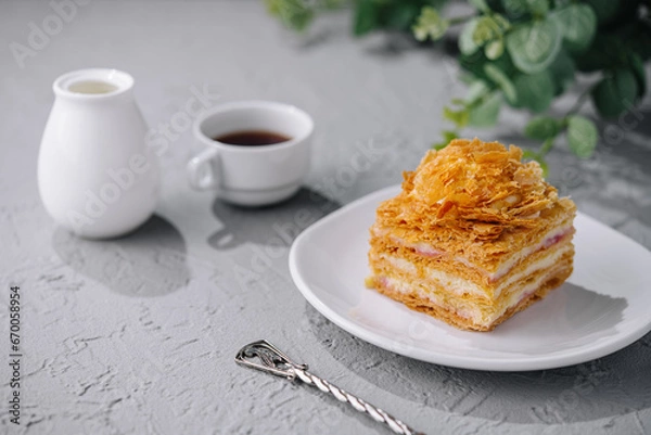 Fototapeta Napoleon cake slices with cup of coffee