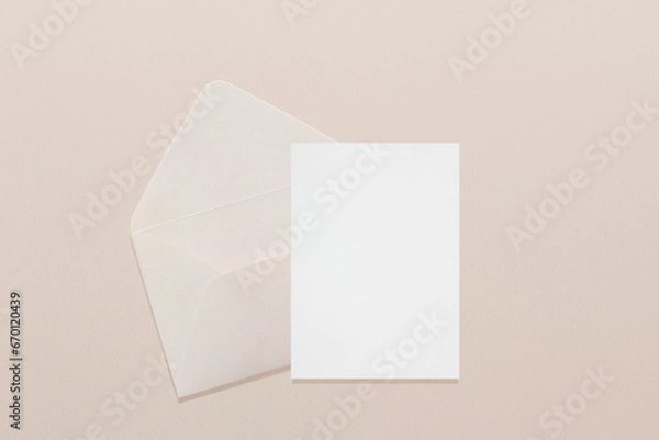 Fototapeta Wedding stationery invitation card mockup 5x7 and beige envelope on neutral beige background, bridal shower mockup. Minimal blank card mockup, thank you card, greeting card