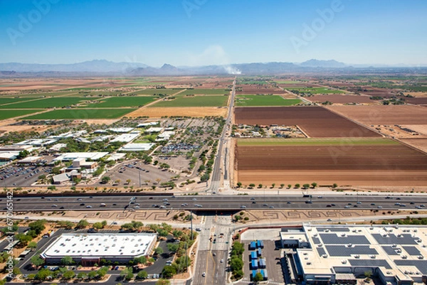 Fototapeta Smoke From A Distant Fire looking east from above the Loop 101 freeway in Scottsdale, Arizona
