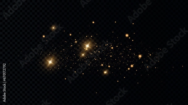 Fototapeta The dust sparks and golden stars shine with special light. Vector sparkles on a transparent background. Christmas light effect. Sparkling magical dust particles. PNG