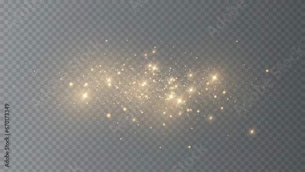 Fototapeta The dust sparks and golden stars shine with special light. Vector sparkles on a transparent background. Christmas light effect. Sparkling magical dust particles. PNG