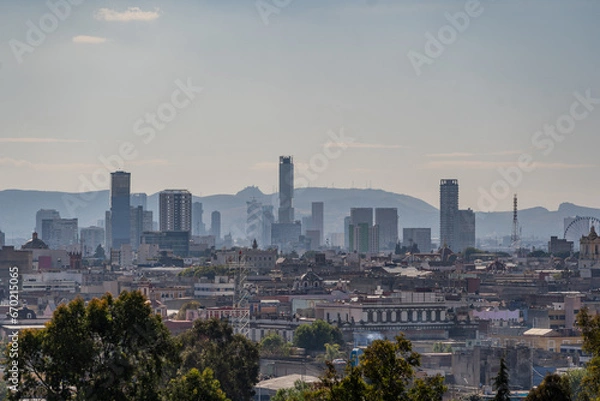 Fototapeta Beautiful view of the large Mexican city of Puebla. View of the endless mountain peaks around the city.