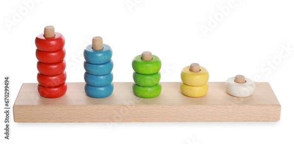 Fototapeta Stacking and counting game wooden pieces isolated on white. Educational toy for motor skills development