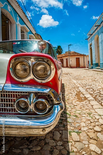 Obraz Old classic car detail in a road of Trinidad in Cuba