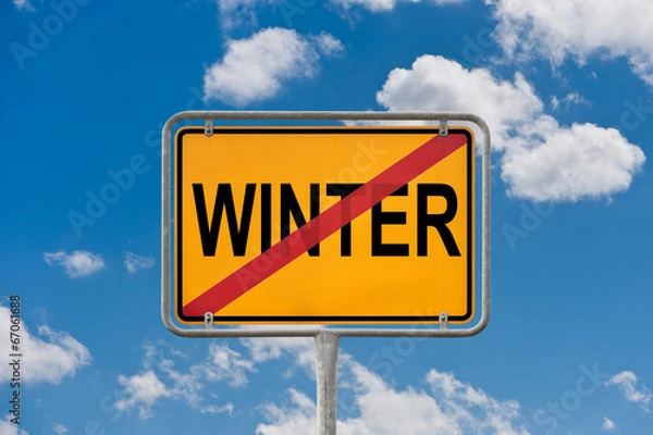 Obraz Ortsschild - Winter - durchgestrichen vor blauem Wolkenhimmel