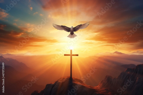 Fototapeta Holy cross symbolizing the death and resurrection of Jesus Christ shrouded in light and clouds at sunset