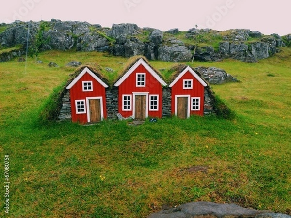 Fototapeta Red little toy houses at Egilsstadir, Iceland