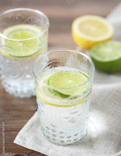 Fototapeta Soft drink with lemon and lime