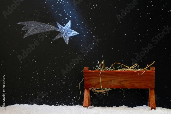 Obraz Manger and star of Bethlehem on snowy night, abstract christmas nativity scene concept