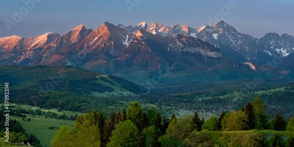 Fototapeta Spring panorama over Spisz highland to Tatra mountains in the morning, Poland and Slovakia.