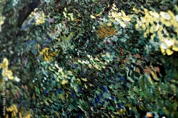 Fototapeta Vivid close-up shot of an abstract painting featuring a mix of green and yellow paint