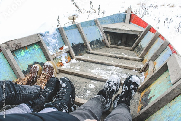 Fototapeta Three in a boat without a dog