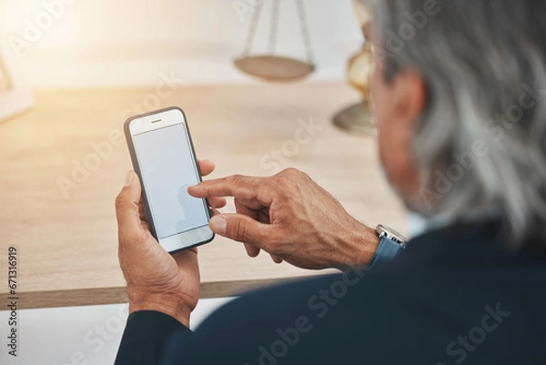 Fototapeta Businessman, hands and phone mockup for communication, networking or browsing at office. Senior man or CEO typing on mobile smartphone display or screen for app, online research or chat at workplace