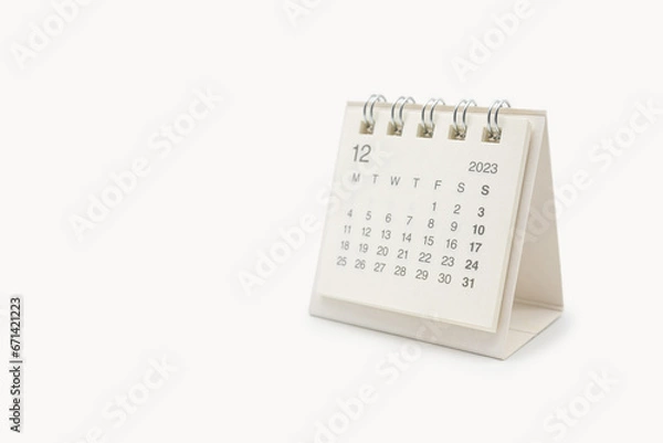 Fototapeta Simple desk calendar for December 2023 isolated on white background. Calendar concept with copy space.