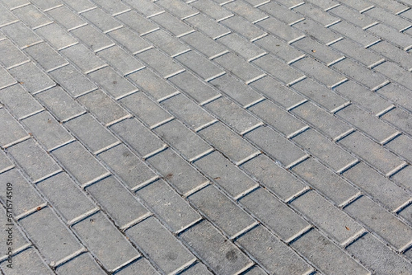 Fototapeta Pavement and the city. Texture, background, photo