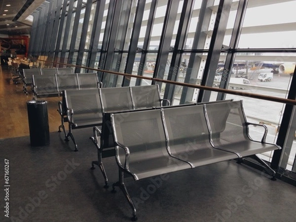 Fototapeta Empty benches in a waiting room at Keflavik airport, Iceland