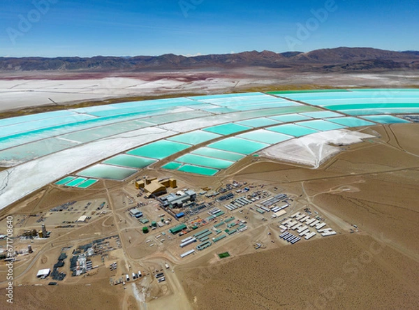 Fototapeta Aerial view of lithium fields / evaporation ponds in the highlands of northern Argentina, South America - a surreal, colorful landscape where batteries are born
