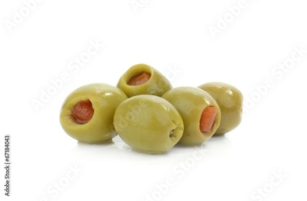 Fototapeta Green olives with paprika filling on a white background