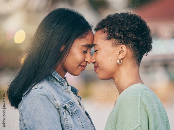 Fototapeta Lesbian, love and intimate couple outdoor, bonding and romance on date together. Happy, gay women and forehead touch for care, commitment and loyalty, trust and support for lgbtq, queer or homosexual