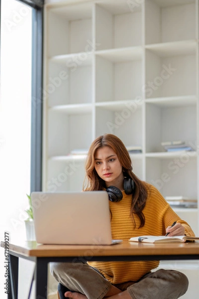 Fototapeta Asian girl student online learning class study online video call zoom teacher, Happy asian girl learn english language online with computer laptop.