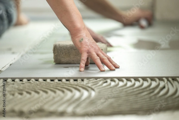 Fototapeta precise tile laying: expert craftsmanship and quality in contracting service