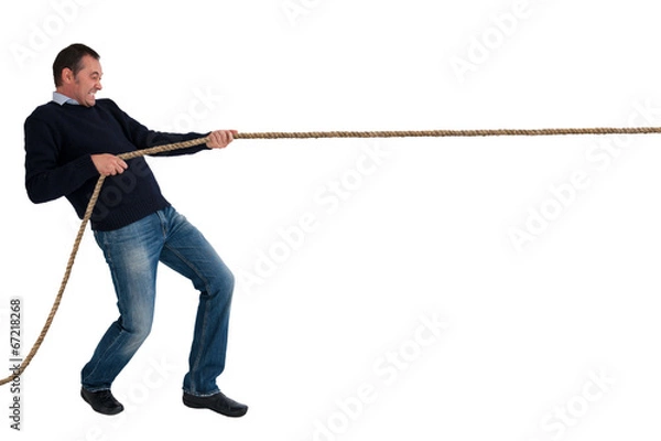 Obraz man tug of war pulling rope isolated