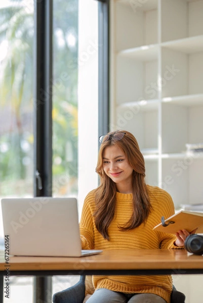Fototapeta Asian girl student online learning class study online video call zoom teacher, Happy asian girl learn language online with computer laptop.