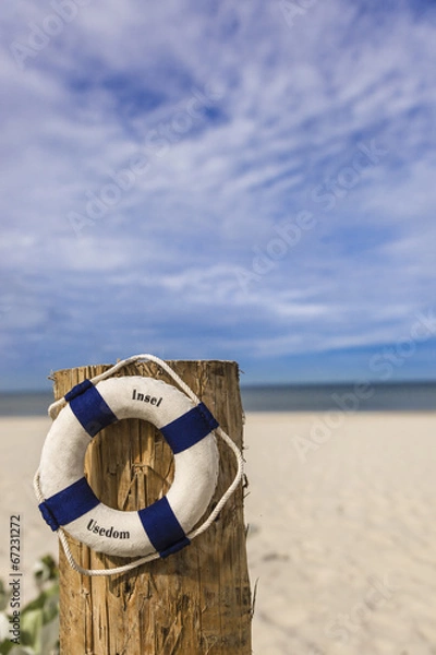 Obraz Rettungsring am Sandstrand