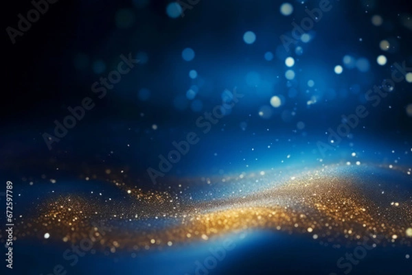 Fototapeta Golden abstract bokeh, waves and particles on blue background. Celebrating Christmas, New Year or other holidays.