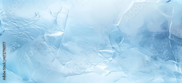 Fototapeta Ice texture background. The textured cold frosty surface of ice block on blue background.