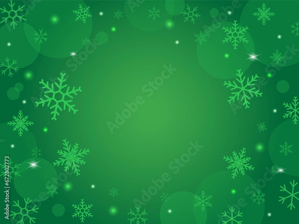 Fototapeta Green Christmas background with snowflakes and shining sparkles