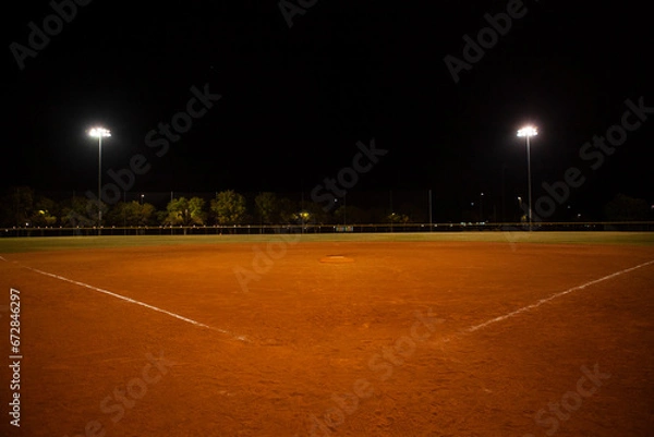 Obraz Empty baseball field at night, view from home plate