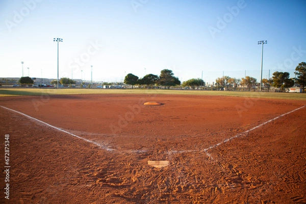 Obraz Empty baseball field view from home plate, late afternoon light