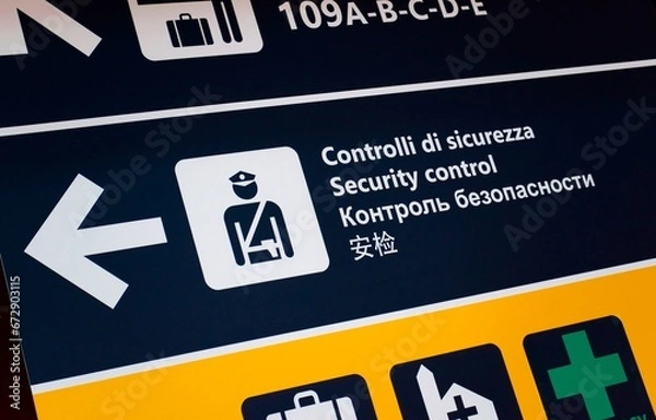 Obraz Security control at the airport, signboard in several languages. Public safety, airport signage concept.
