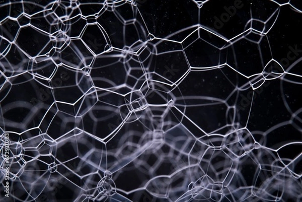 Obraz Grayscale of soap bubbles isolated on dark background